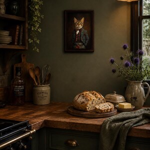 Framed portrait of Bengal cat dressed in Tartan