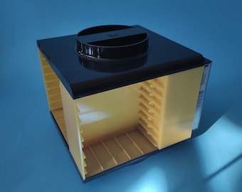 Vintage Cassette Carousel: Yellow & Black Audio Tape Storage - 1970s Yugoslavia