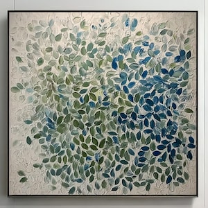 May include: Square abstract painting with a black frame. The artwork features a textured surface with a pattern of green and blue leaf shapes against a neutral background. The painting is displayed above a wooden bench with decorative vases.