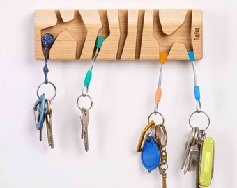 Porte-clés en bois pour grimpeurs