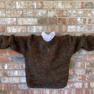 Moss green and brown, chunky, hand knit wool sweater with long sleeves