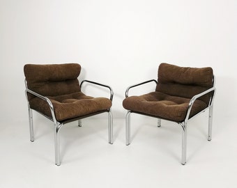 One of tow Bauhaus lounge armchairs in Tublar chrome with velvet upholstery, 1980s