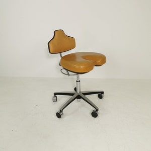 Industrial vintage leather office dental chair by chyres Virginia
