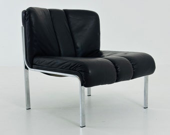 Mid century lounge chair by Girsberger Eurochair 1200 dark Braun leather for Hans Eichenberger. Switzerland 1980s