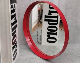 Very nice Red Spaceage vintage mirror plastic from the 70s with a typical Spaceage design,