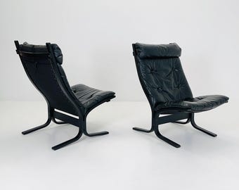 Set of 2 Mid Century “Siesta” lounge chair by Ingmar Relling, Westnofa Furniture, Norway — Full Black Edition, Leather & Wooden Frame, 1960s