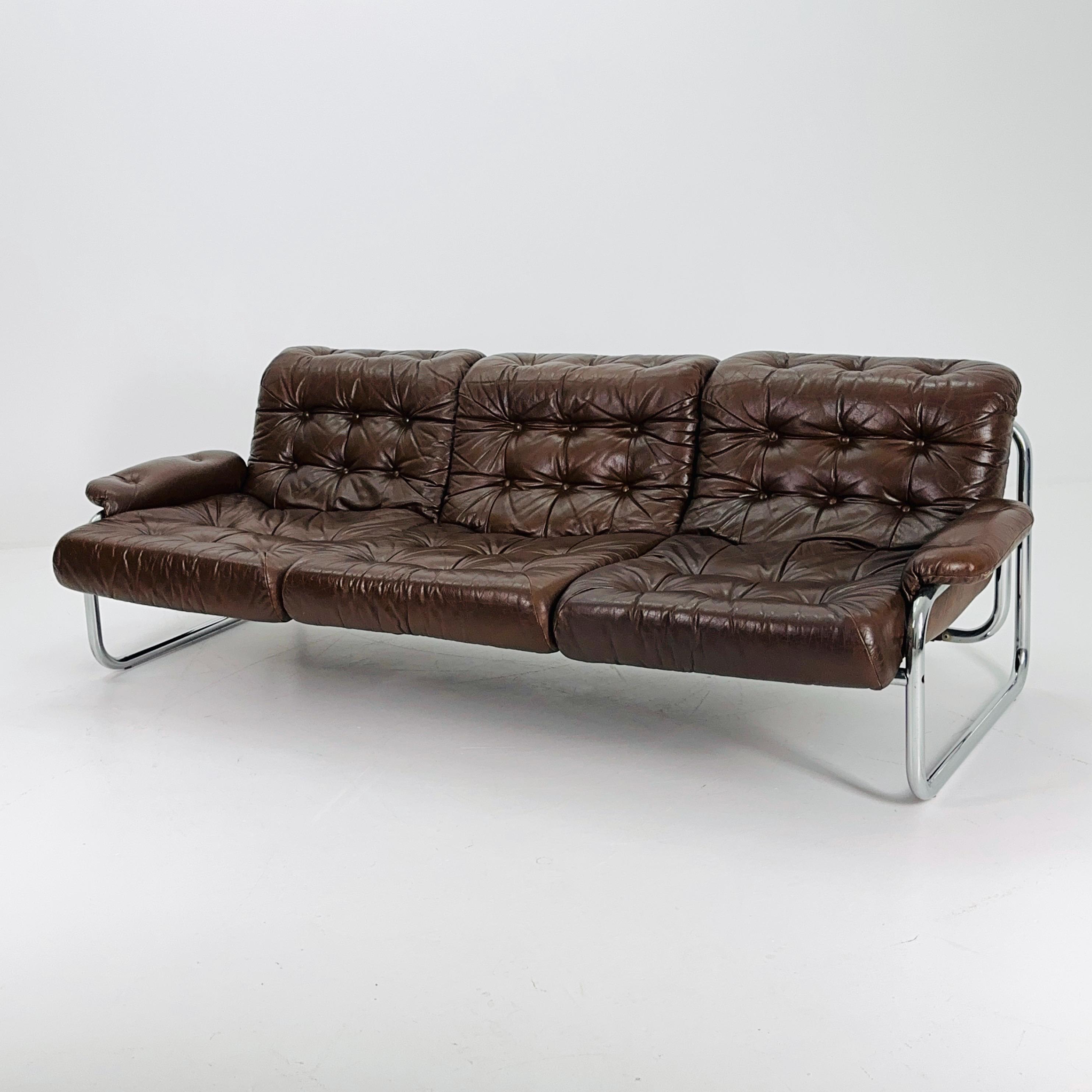 Divano a posti della metà del secolo con struttura tubolare in