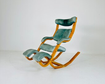 Mid century sea green Gravity rocking  Lounge chair by Peter Opsvik for Stokke, 1980s