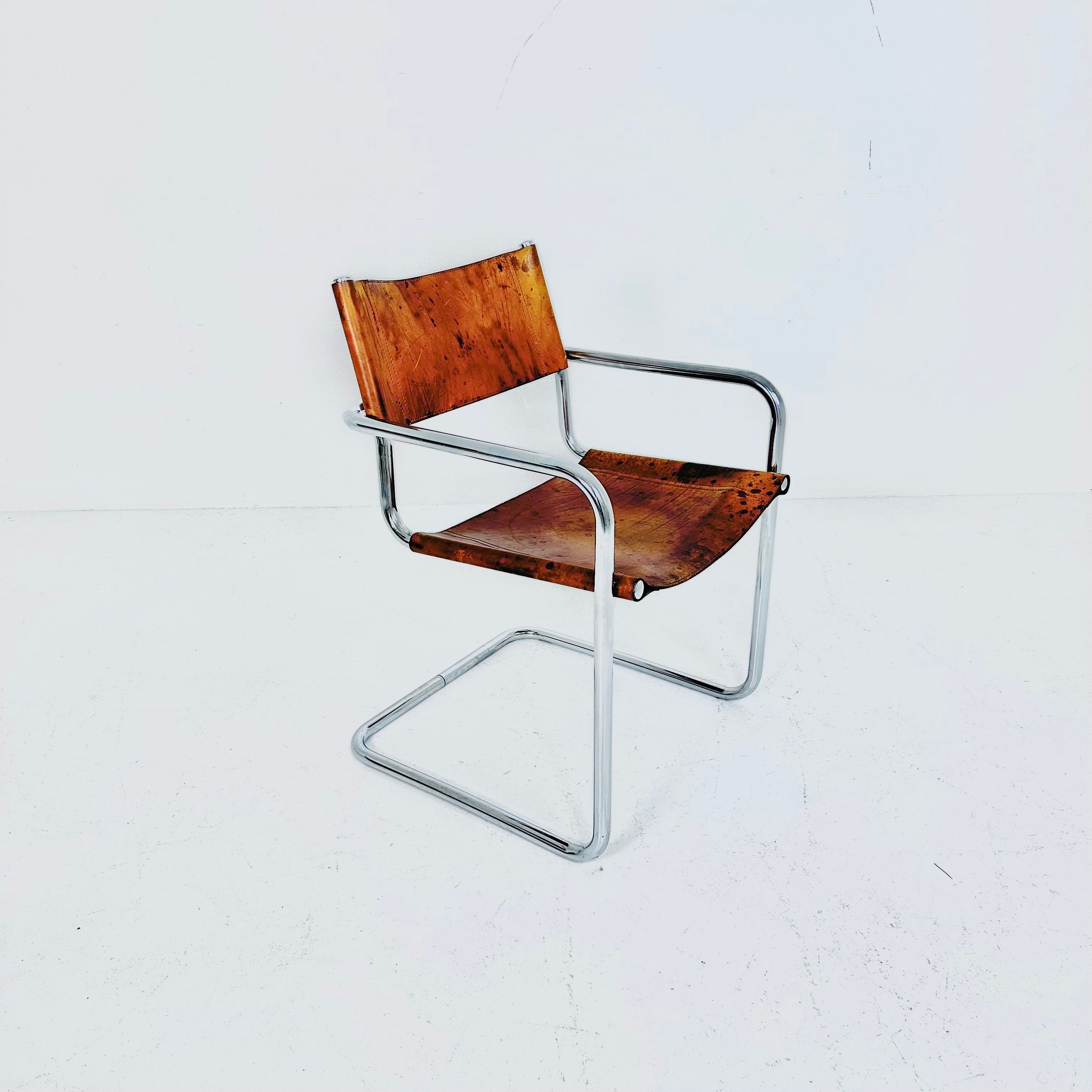 1 of 3 Vintage Model S34 Cognac Saddle Leather Dining Chairs by