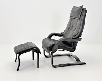 Sillón y otomana escandinavos de mediados de siglo de Rybo Rykken AIM 330 – Chaise longue reclinable ajustable de cuero gris oscuro – Noruega, década de 1990