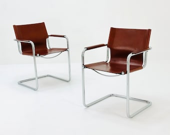 Set med 2 Bauhaus Matteo Grassi besöksfåtöljer i congac-läder, Italien, 1980-talet