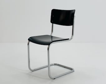 Silla voladiza S43 Mart Stam de mediados de siglo, de haya negra con tubo de acero cromado, fabricada por Thonet en Alemania en la década de 1980.