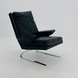 Mid Century Black Swing Lounge Chair by Reinhold Adolf for Cor Germany 1960s