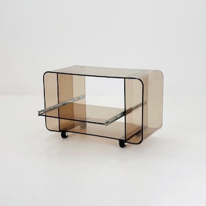 Space age Smoked Brown Plexiglass Trolley by Michel Dumas for Roche Bobois 1970s