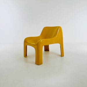 Space Age vintage lounge chair model Anatomical yellow color by Ahti Kotikoski 1968s for Asko Finland.