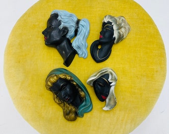 Mid century wall masks women faces 1950s, Germany