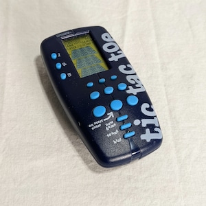 VINTAGE Radica Tic-Tac-Toe handheld LCD game - 1998 game (Tested & Works!)