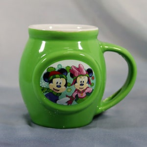 Mickey & Minnie Mouse Winter Holiday coffee mug with spoon-holder hole
