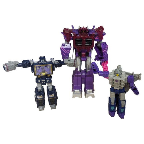 Three (3) Transformers Robot Action Figures - Various Sizes & Conditions