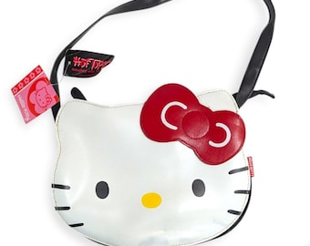 Borsa a tracolla Hello Kitty con faccina, Hot Topic Sanrio, bianca, nera, con fiocco rosso, etichetta Y2K