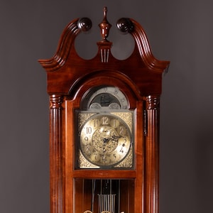 Howard Miller Grandfather Clock – Elegant Mahogany Cable-Driven Floor Clock with Triple Chime