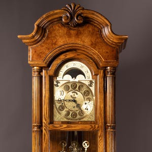Howard Miller Grandfather Clock – Mechanical Cable-Driven Clock in Solid Red Oak Case
