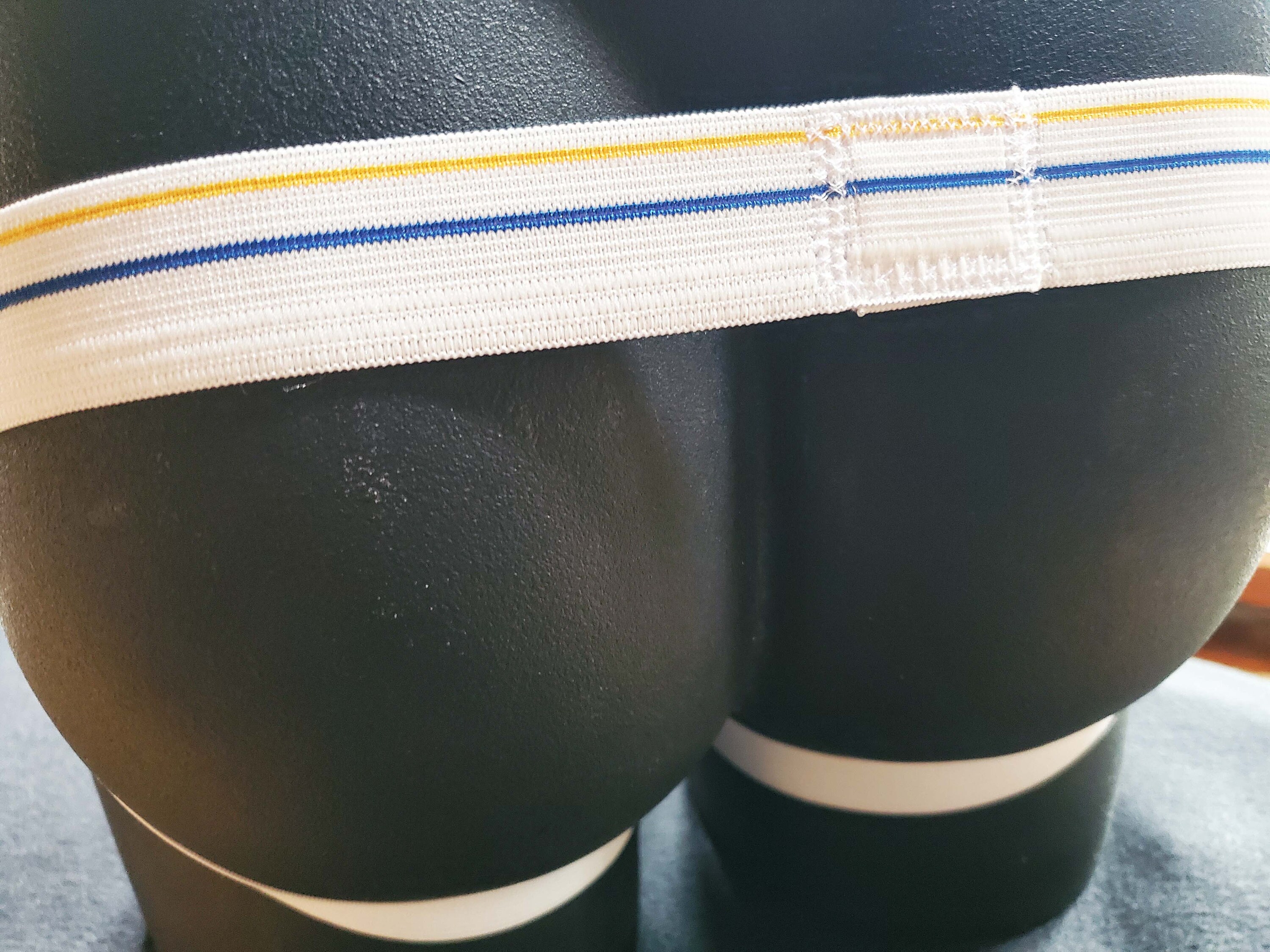 Gold Mesh Sport Jock, White Waistband With Yellow and Blue Stripes