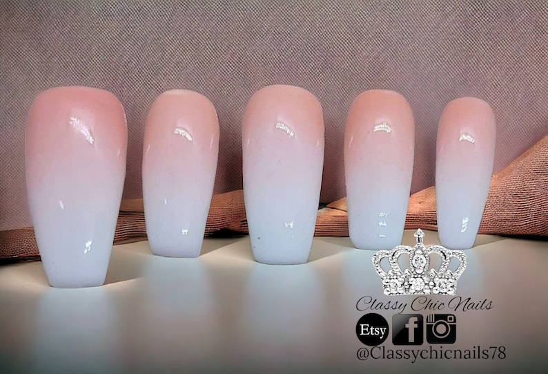 May include: Five press-on nails featuring a smooth ombre gradient from a soft peach at the cuticle to a crisp white at the tip. A silver crown icon is displayed above the text Classy Chic Nails, Etsy, and the handle @Classychicnails78.