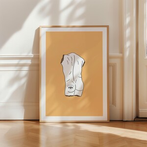 Peut inclure: Un dessin au trait blanc d'une statue nue avec un &oelig;il sur le dos, sur un fond jaune.