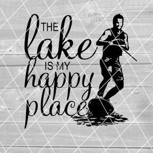 May include: Black and white graphic design with the text "The lake is my happy place" and a silhouette of a person waterskiing.
