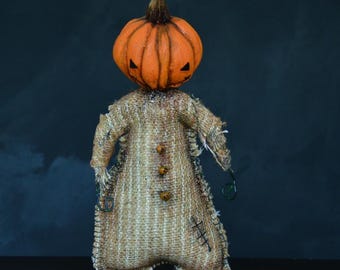 Handmade Burlap Halloween Pumpkin Doll: Spooky Rustic Decor