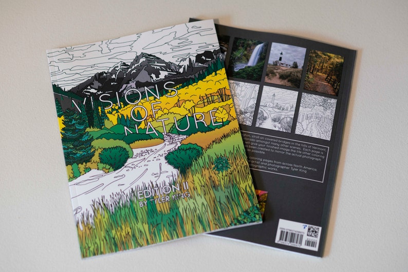May include: A coloring book titled "Visions of Nature, Edition II by Tyler King" with a mountain scene on the front cover and a black and white preview of the illustrations on the back cover.