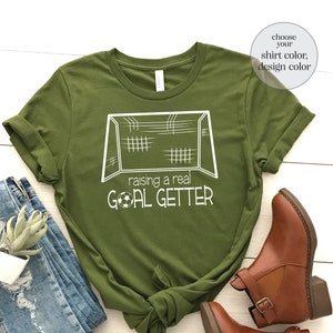 Raising A Real Goal Getter Shirt, Soccer Mom Shirt, Soccer Lover Shirt, Soccer Mom Gift, Sports Mom Shirt, Sports Lover Mom Shirt