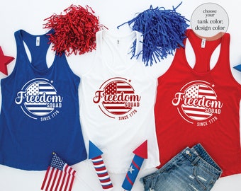 May include: Three tank tops with a red, white, and blue American flag design and the text "Freedom Squad Since 1776".