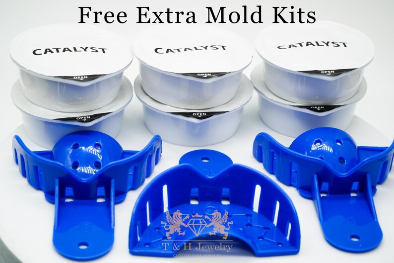 May include: Free extra mould kits for making custom jewellery. The kits include three white plastic containers labelled "Catalyst" and three blue plastic moulds.