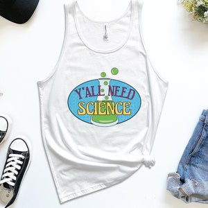 May include: White tank top with a blue and yellow graphic of a beaker and the text "Y'all Need Science".