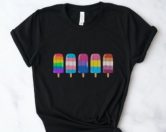 May include: Black t-shirt with a row of six colorful popsicles, each representing a different pride flag.