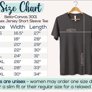 May include: A dark gray unisex short sleeve tee shirt hanging on a wooden hanger. The image includes a size chart with measurements in inches for sizes XS to 4XL. The text on the chart reads "Bella+Canvas 3001 Unisex Jersey Short Sleeve Tee".