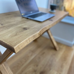 Live edge rustic desk on timber X-frame legs handmade from solid wood to look like waney edge single plank desk