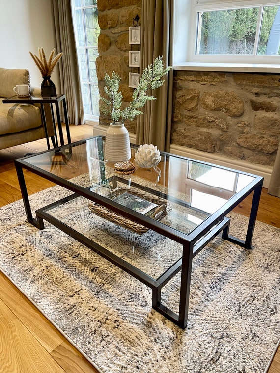 Iron and glass coffee table deals