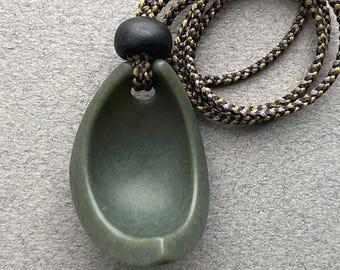 Hand Carved Jade Pendant: "Textured Nut Hull", Basalt Bead, Braided Silk Cord