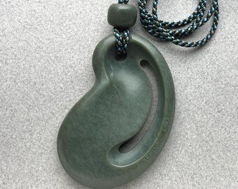 Hand carved Wyoming jade necklace. "Olive Warped Space" with jade beads