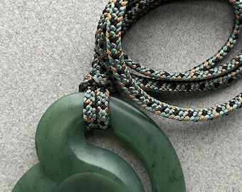 Hand carved jade pendant, "Yukon Coriolis",  Yukon nephrite