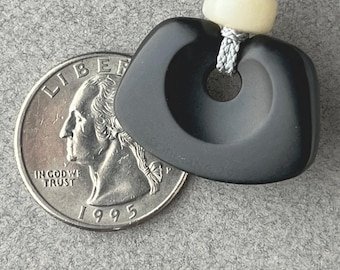 Nearly Black Wedge Celt, hand carved jade pendant, white jade bead and silk cord