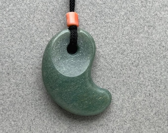 Hand carved jade pendant, "Small Soft Green Magatama ", with coral bead and silk braid