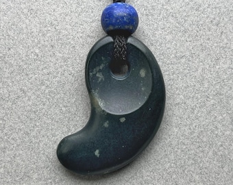 Hand carved jade pendant, "Dark, Spotted Magatama", Wyoming nephrite, lapis bead, silk cord