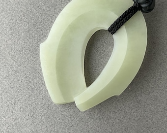 Hand carved jade pendant, "Diving Dragon", Siberian nephrite, with basalt beads
