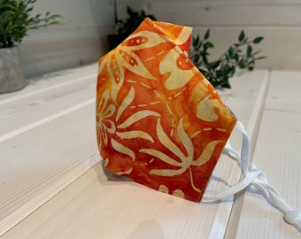 Orange Leaves and Flowers Reusable 3 layer fabric face mask in Canada – Machine washable fabric mask – Three layer mask.
