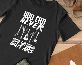 Camiseta de guitarra para niños El guitarrista nunca tiene demasiadas guitarras Camiseta para niños Camisa de músico unisex