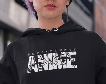 May include: A black hoodie with a white graphic of the word "Anime" with stylized eyes. The text "私はアニメが好きです" is written in Japanese above the word "Anime".